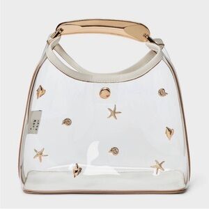 Clear shell bag 
Brand new with tags